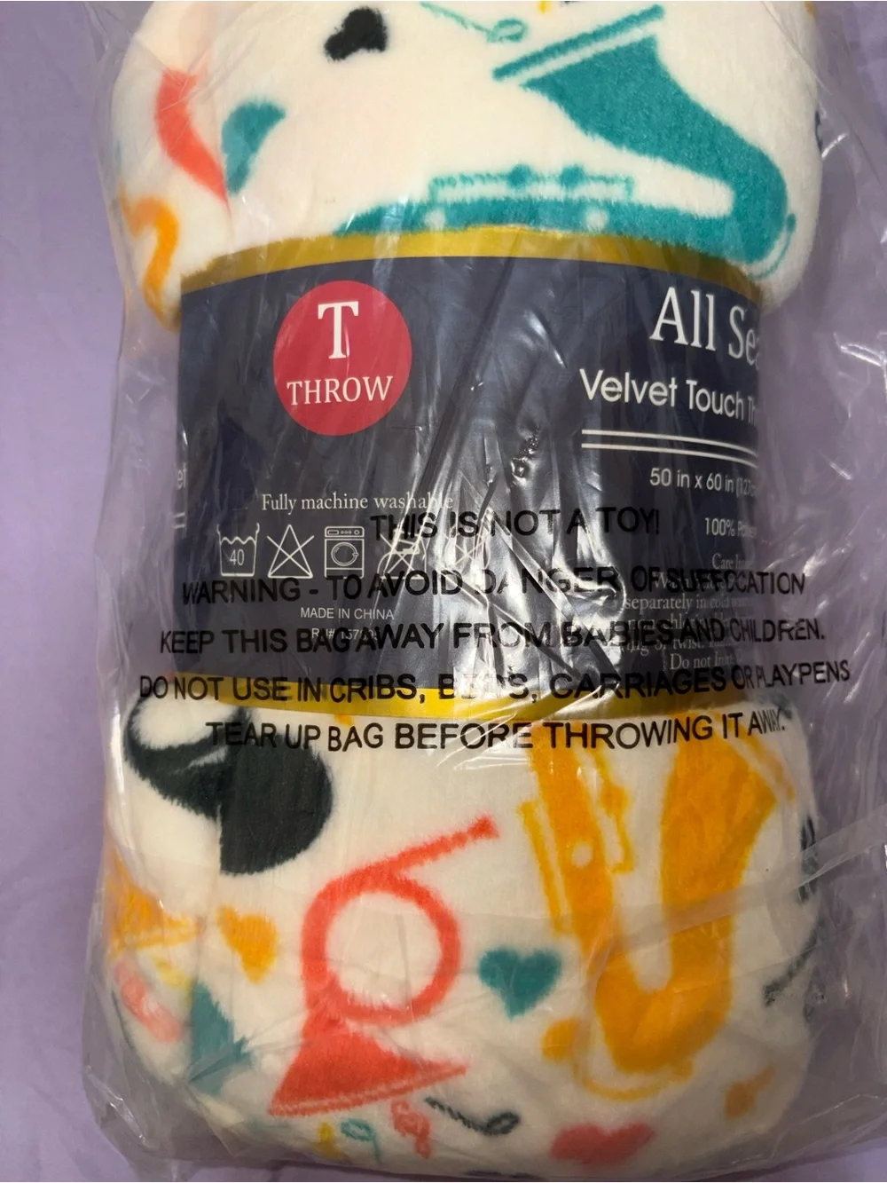 Target White Fleece Throw Blanket with Multicolor Music Print